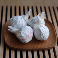 Dragon Balls: Tè bianco Yueguangbai e Tè rosso Dianhong